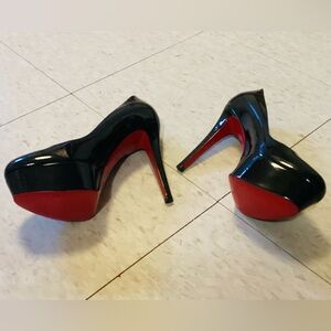 Elegant Black Christian Louboutin, Round Toe, Signature Red Bottoms High Heels